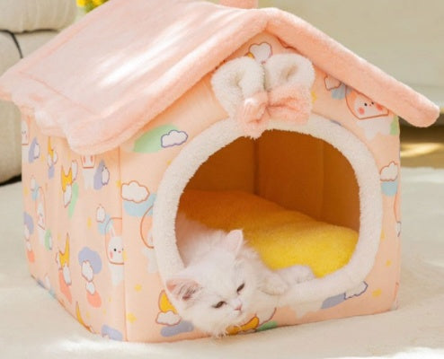 a display image of the Snugglebugsupply's Removable and Foldable Pet House while a cat is lying down inside it 