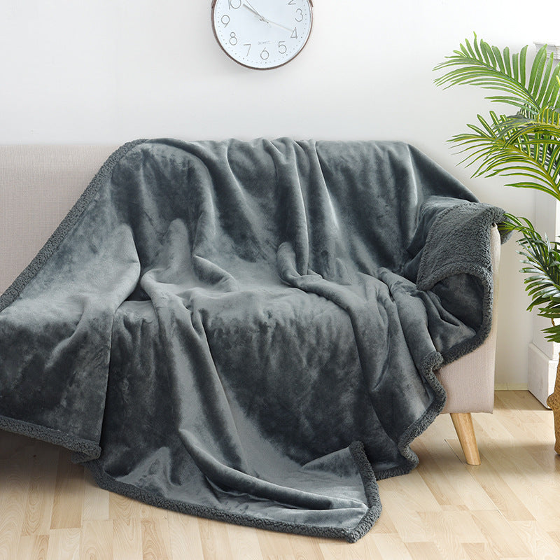 A display image of  the snugglebugsupply's Pet Thick Waterproof Cushion Blanket being laid on a chair 