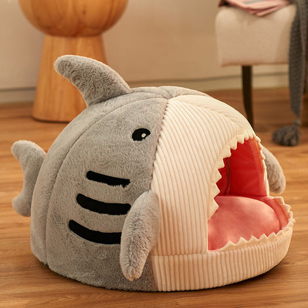 A display image of Snugglebugsupply's Shark-Shaped Pet House Bed