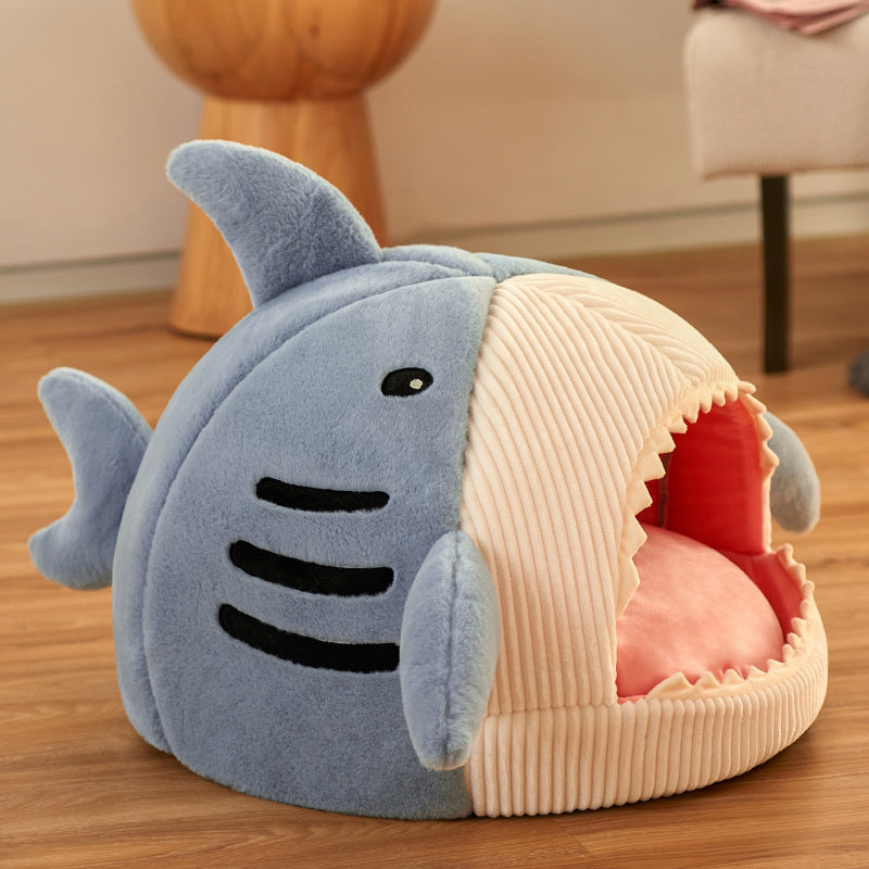 A display image of Snugglebugsupply's Shark-Shaped Pet House Bed